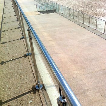 Beach promenade framed glass railings